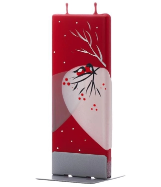 raudona kalėdinė žvakė sniegenos