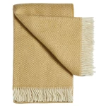 Geltonas vilnonis pledas su kutais